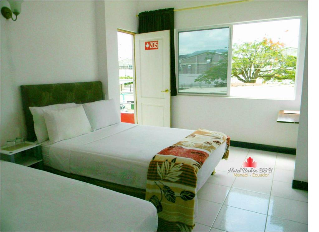 Postel nebo postele na pokoji v ubytování Bahia B&B