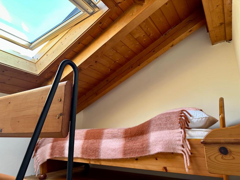 Postel nebo postele na pokoji v ubytování Mansarda con vista