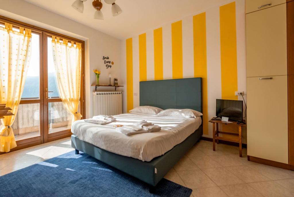 Postel nebo postele na pokoji v ubytování Happy Guest Apartments - Lake Panorama & Pool