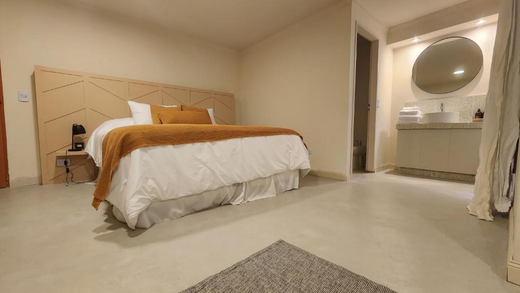 Postel nebo postele na pokoji v ubytování Casa Par Grand Suites