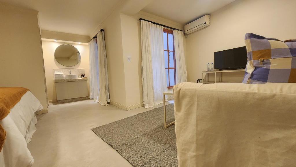 Postel nebo postele na pokoji v ubytování Casa Par Grand Suites