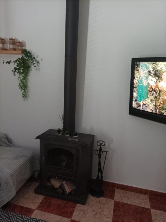 Televízia a/alebo spoločenská miestnosť v ubytovaní CASA SENDERO DEL RIO