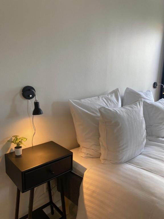 Postel nebo postele na pokoji v ubytování Harbour Inn Hundested