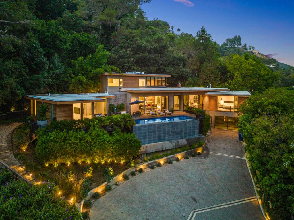 an aerial view of a house with a swimming pool at Beverly Hillside Haven in Los Angeles