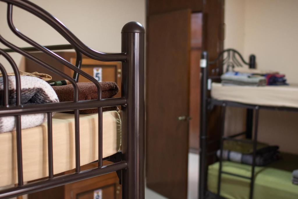Postel nebo postele na pokoji v ubytování Hostal Encounter Guanajuato