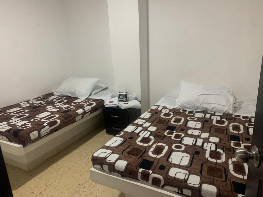 Ένα ή περισσότερα κρεβάτια σε δωμάτιο στο Hotel La Fresa