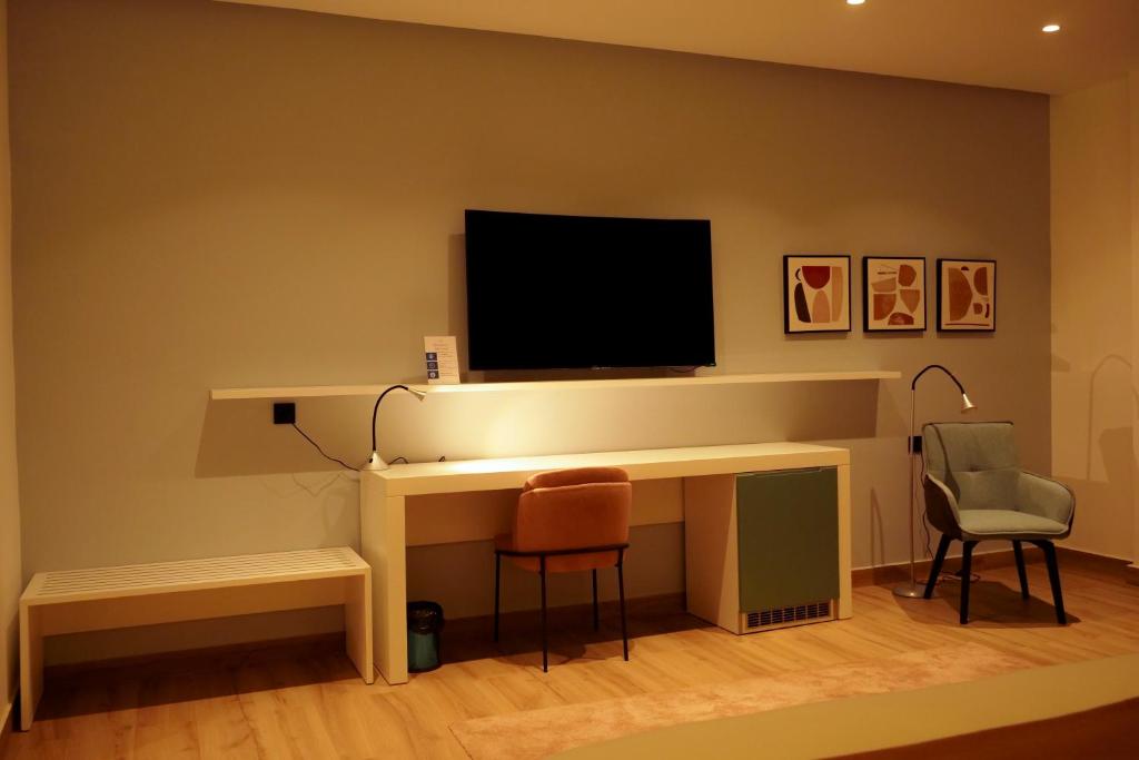 TV a/nebo společenská místnost v ubytování HOTEL HIBA