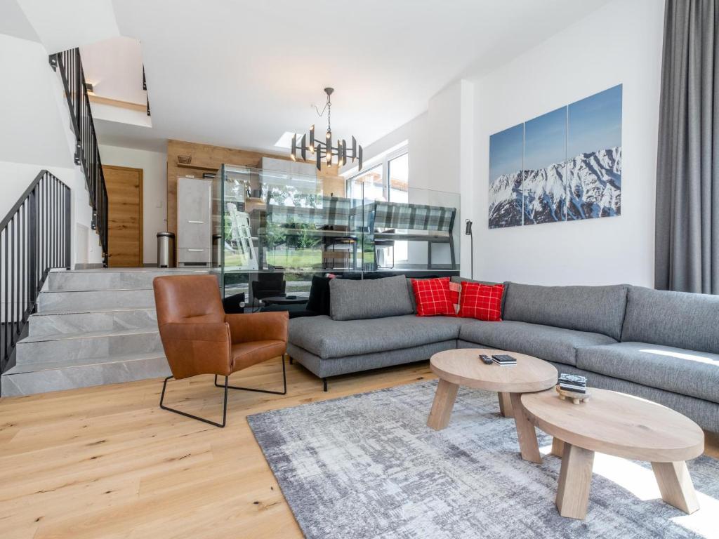 a living room with a couch and a table at Goldstern in Sankt Lorenzen ob Murau