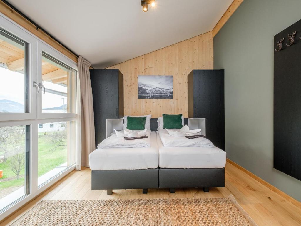 Postel nebo postele na pokoji v ubytování Aquarius Haus 8 TOP 17
