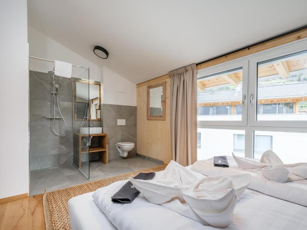 Postel nebo postele na pokoji v ubytování Aquarius Haus 8 TOP 17