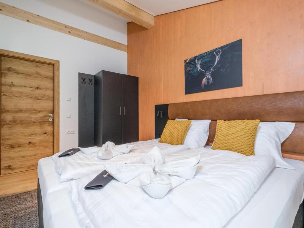 Postel nebo postele na pokoji v ubytování Aquarius Haus 8 TOP 17