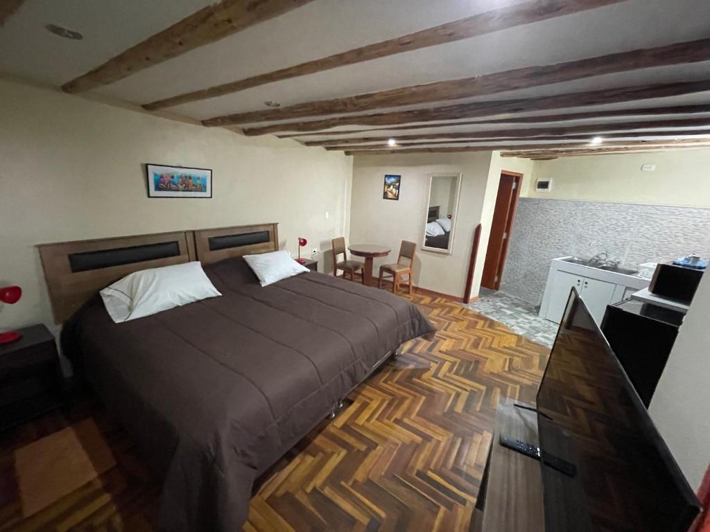 Postel nebo postele na pokoji v ubytování Anka Wasi Lodging