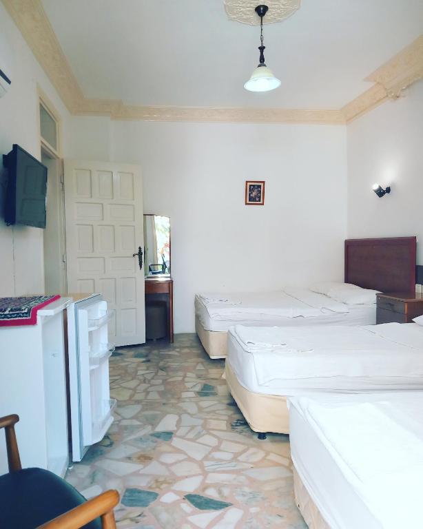 Postel nebo postele na pokoji v ubytování Hotel Anadolu