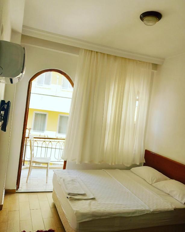 Postel nebo postele na pokoji v ubytování Hotel Anadolu