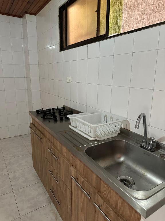 Kuchyň nebo kuchyňský kout v ubytování Jhonny Cay Collection Apartahotel