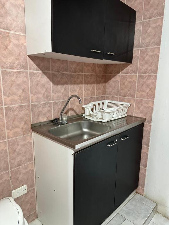 Kuchyň nebo kuchyňský kout v ubytování Jhonny Cay Collection Apartahotel