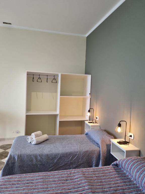 Una cama o camas en una habitación de Bello Jazmin 2