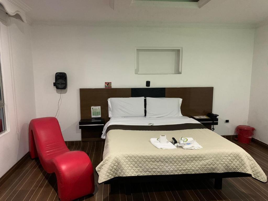 Postel nebo postele na pokoji v ubytování Hotel Planeta 3