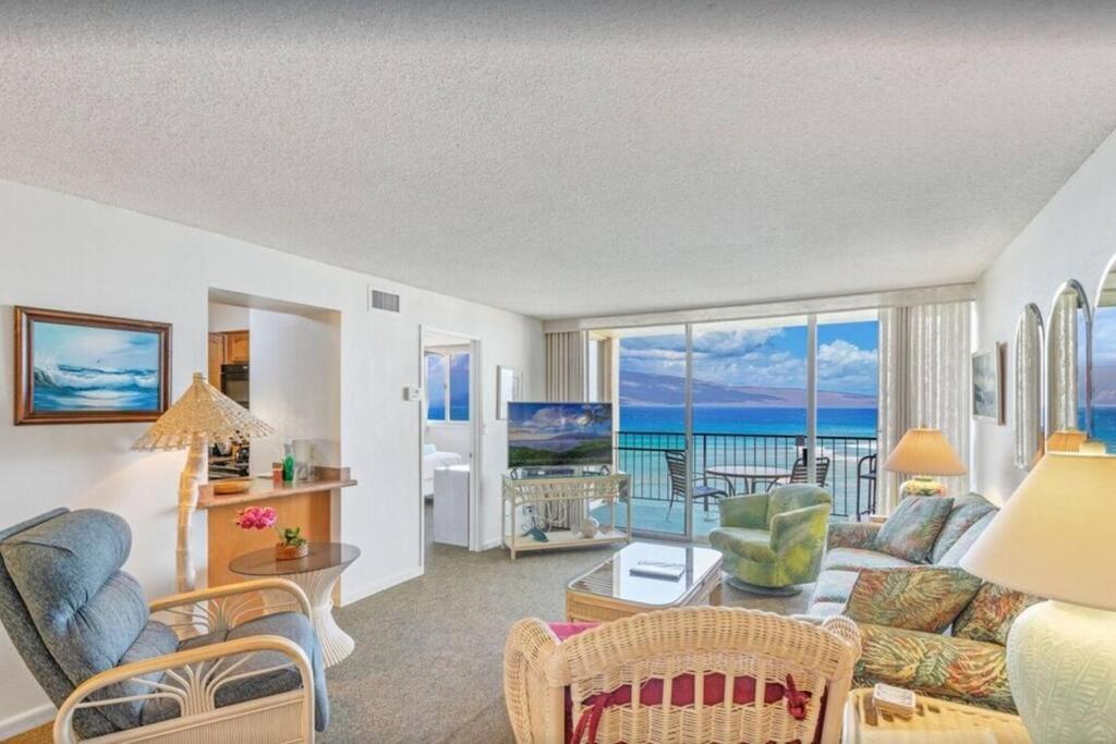 a living room with a view of the ocean at Royal Kahana 1009- Oceanfront unobstructed views from the 10th floor in Kahana