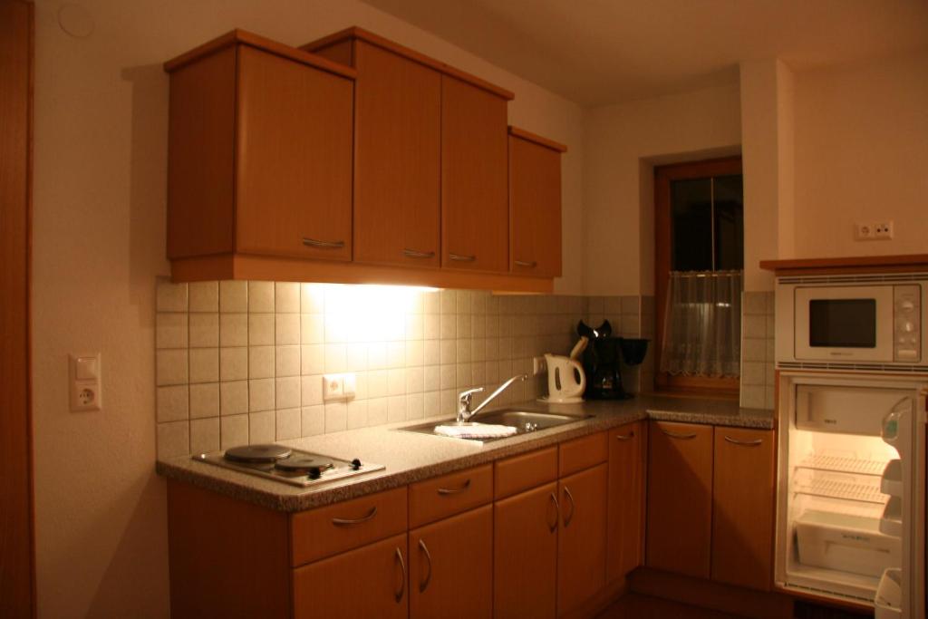 Kuchyň nebo kuchyňský kout v ubytování Haus Alpina
