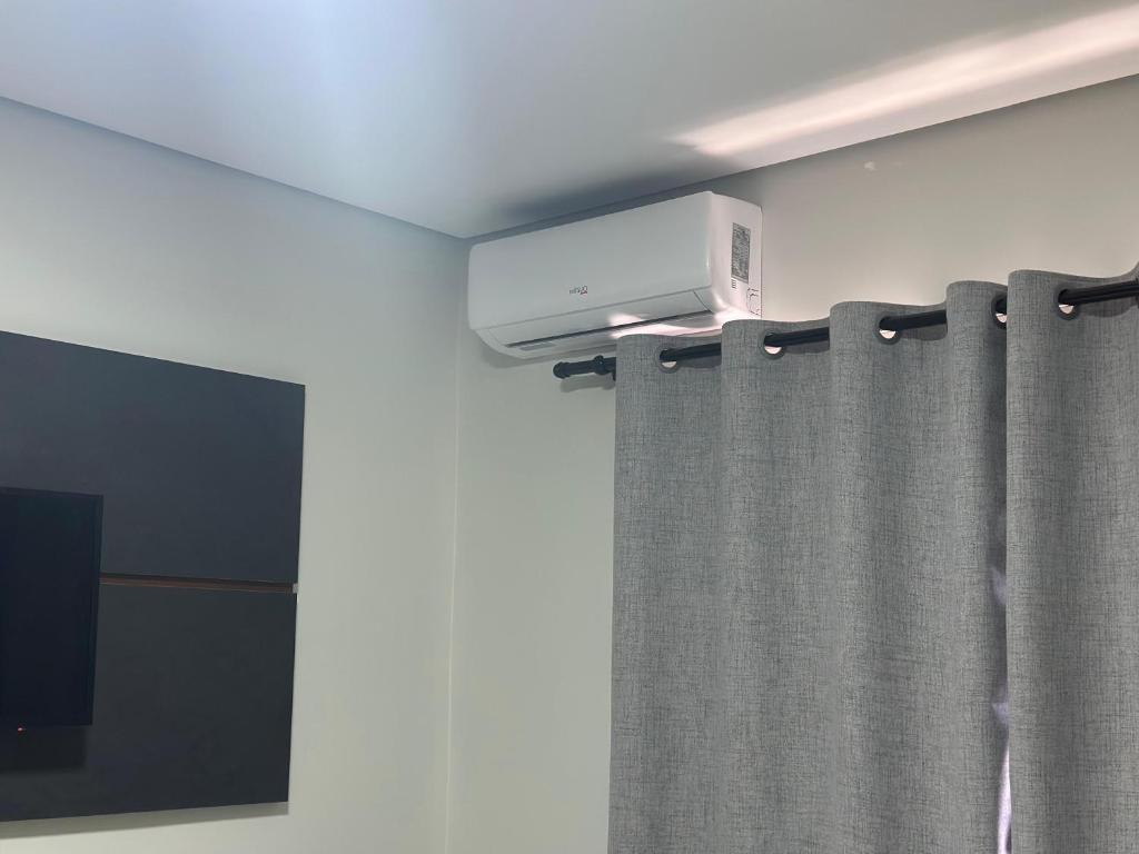 TV a/nebo společenská místnost v ubytování Hotel 7 Quedas