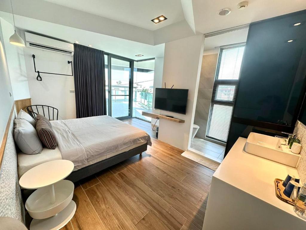 TV a/nebo společenská místnost v ubytování Galilee B&B 加利利海民宿