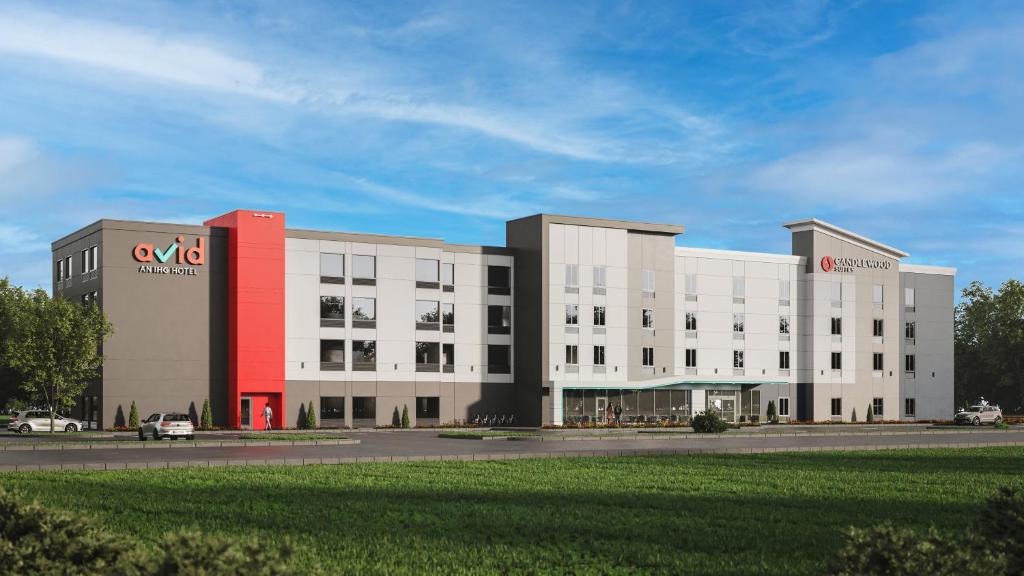 a rendering of a building with a cvs pharmacy at avid hotel North Platte, an IHG Hotel in North Platte