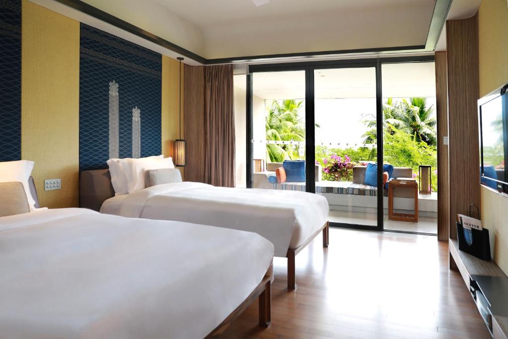 Postel nebo postele na pokoji v ubytování InterContinental Sanya Resort by IHG