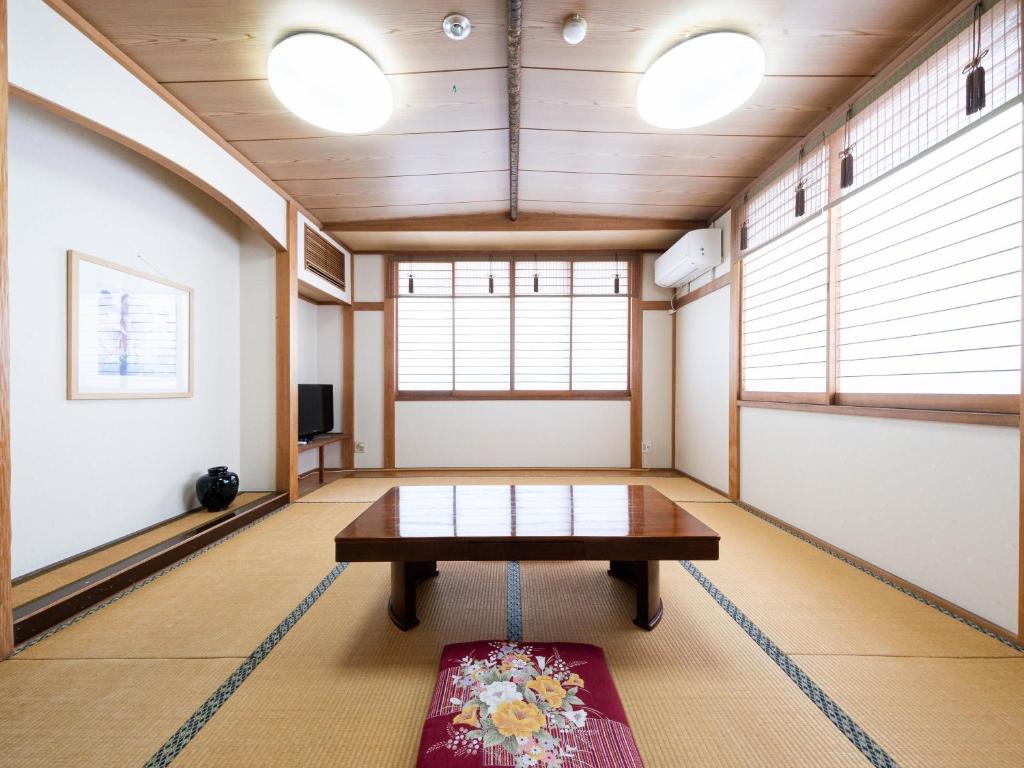 Fotografie z fotogalerie ubytování Fuji Sakura Onsen Ryokan v destinaci Fuefuki