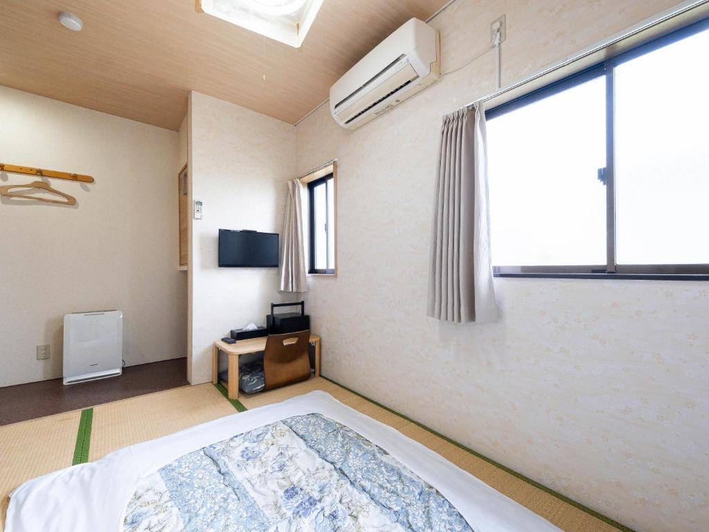 TV a/nebo společenská místnost v ubytování Fuji Sakura Onsen Ryokan