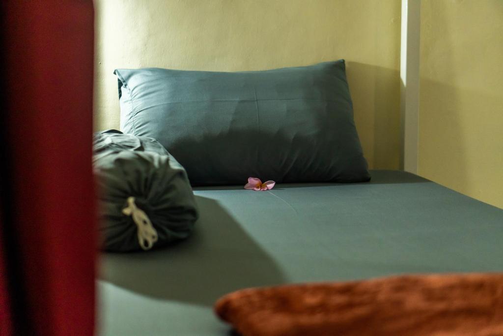 Postel nebo postele na pokoji v ubytování Maharani Hostel