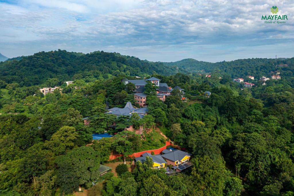an aerial view of a house in the forest at Mayfair Spring Valley in Guwahati