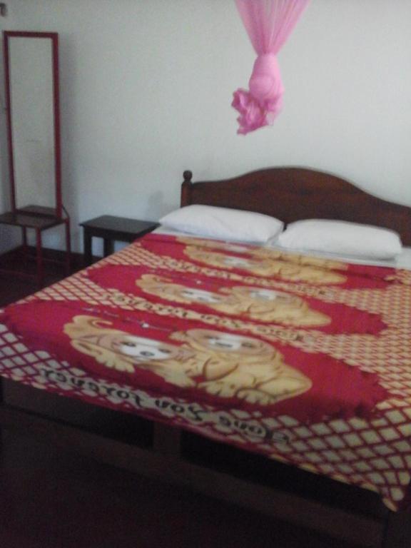 Postel nebo postele na pokoji v ubytování Majestic Tourist Hotel