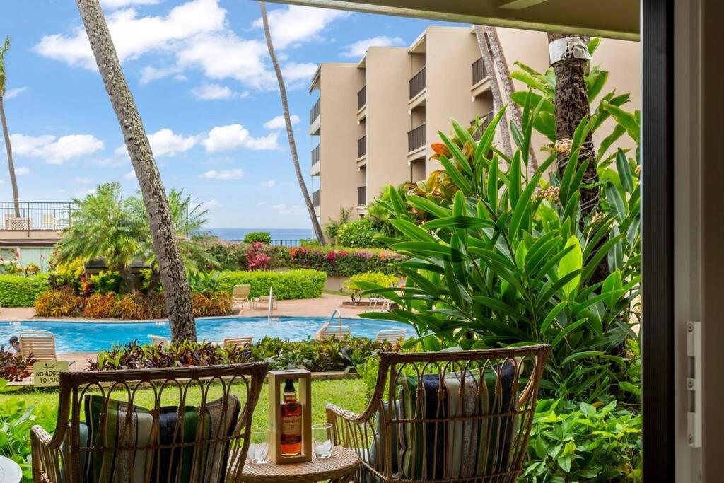 a view of the pool at the resort at Hale Ono Loa 114- Ground floor partial ocean view gem in Kahana