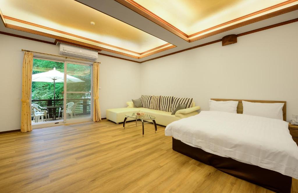 Postel nebo postele na pokoji v ubytování Hui-Lai Resorts