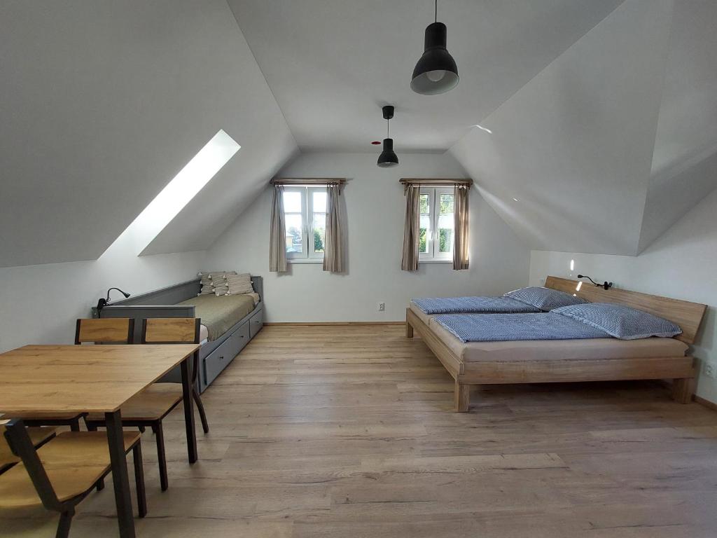 Postel nebo postele na pokoji v ubytování Apartmány Ema a Ela