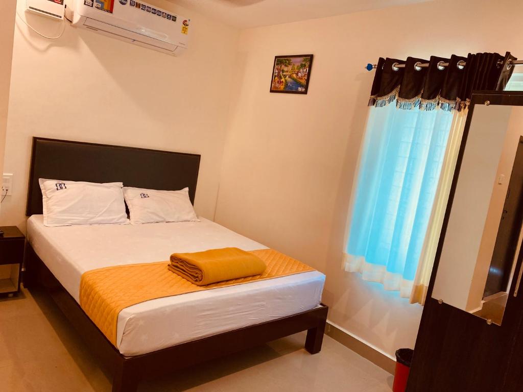 Postel nebo postele na pokoji v ubytování Hotel Sitar Grand