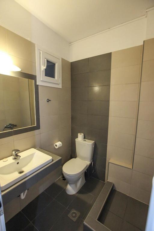 Koupelna v ubytování Skentos Hotel