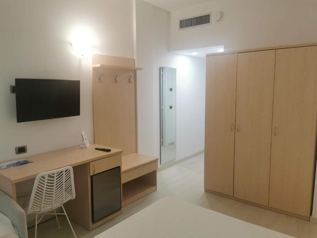 TV a/nebo společenská místnost v ubytování Hotel Gabbiano Beach