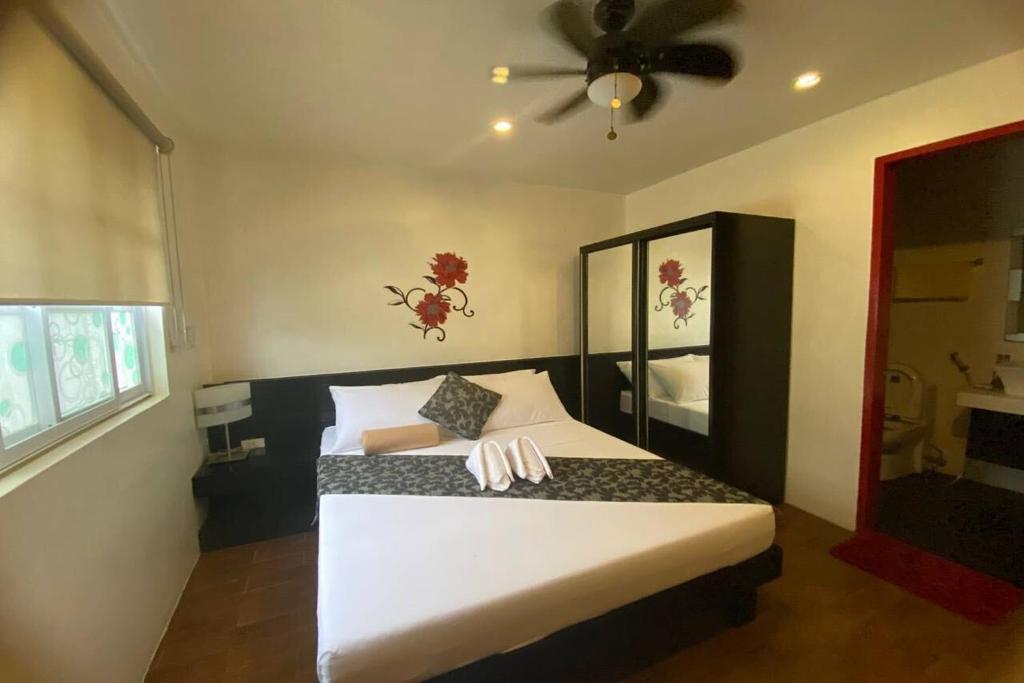Postel nebo postele na pokoji v ubytování Micasa Lodge Palawan