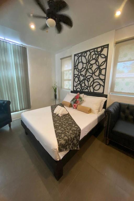 Postel nebo postele na pokoji v ubytování Micasa Lodge Palawan