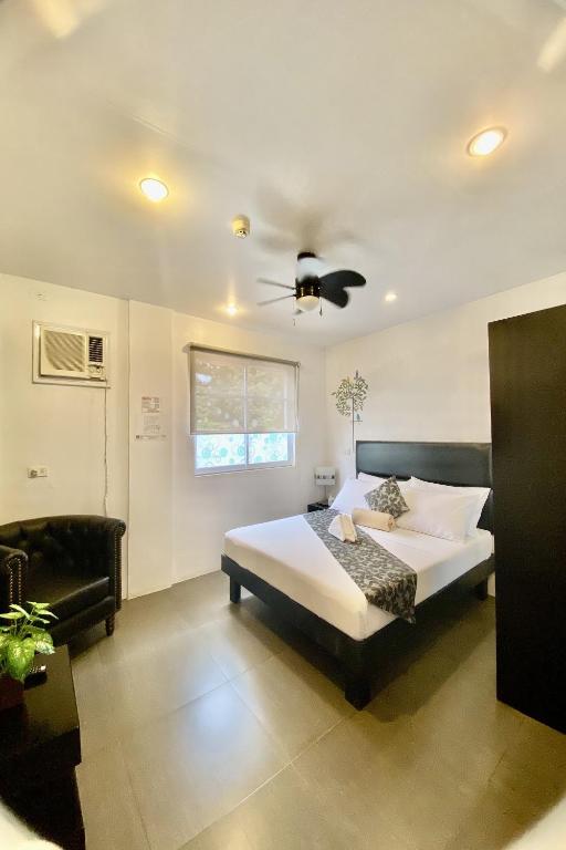 Postel nebo postele na pokoji v ubytování Micasa Lodge Palawan