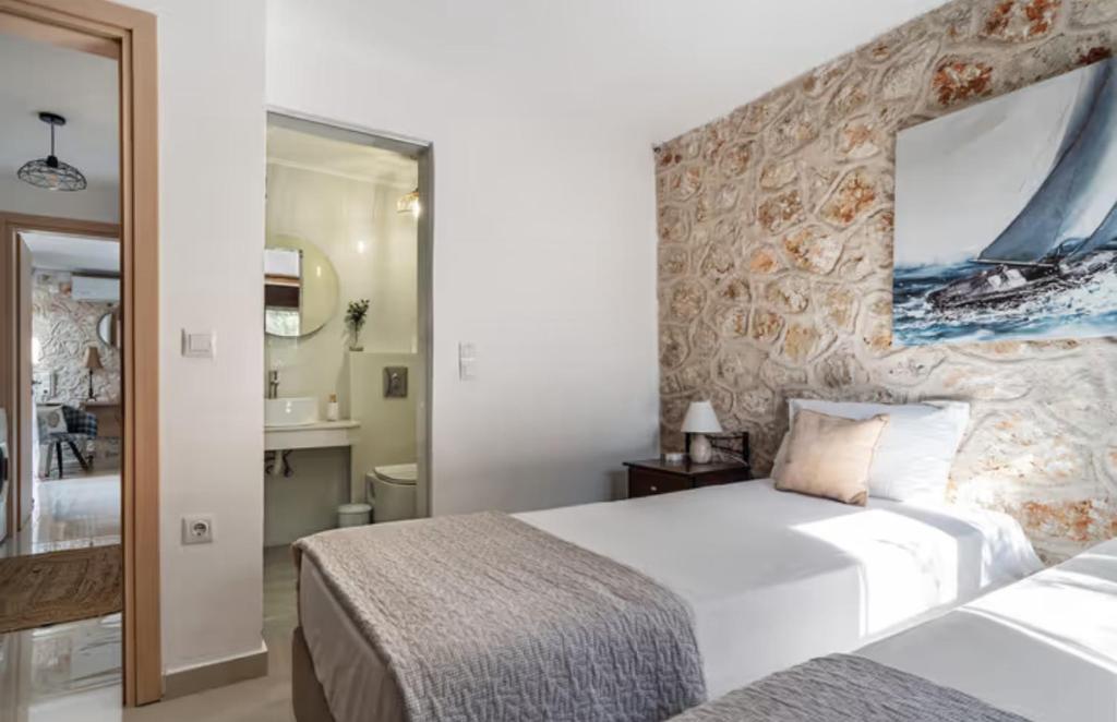 Postel nebo postele na pokoji v ubytování Key Villas