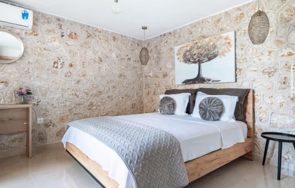 Postel nebo postele na pokoji v ubytování Key Villas