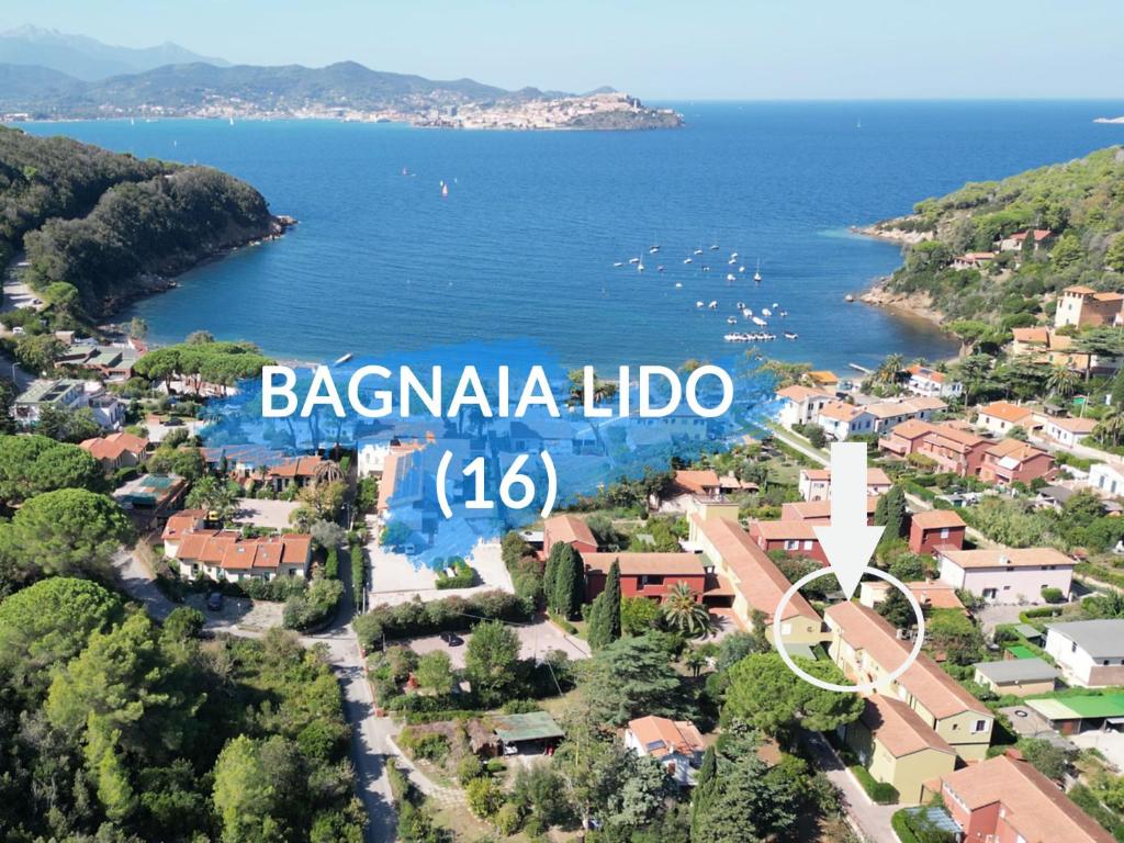an aerial view of a resort with a large sign at Bagnaia Lido 16 - ArgonautiVacanze in Portoferraio