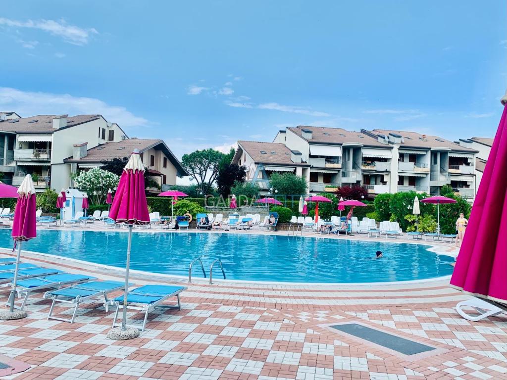 Der Swimmingpool an oder in der Nähe von Giada Apartment - Tre piscine e Bar - Desenzano