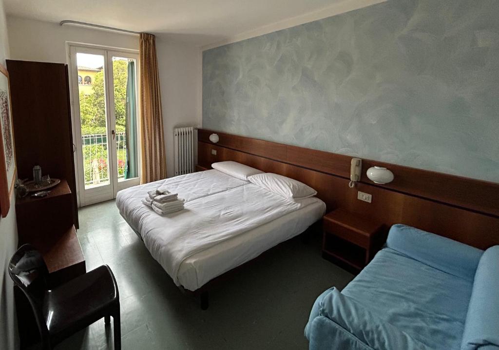 Postel nebo postele na pokoji v ubytování Hotel "ALBERGO DA PINA"