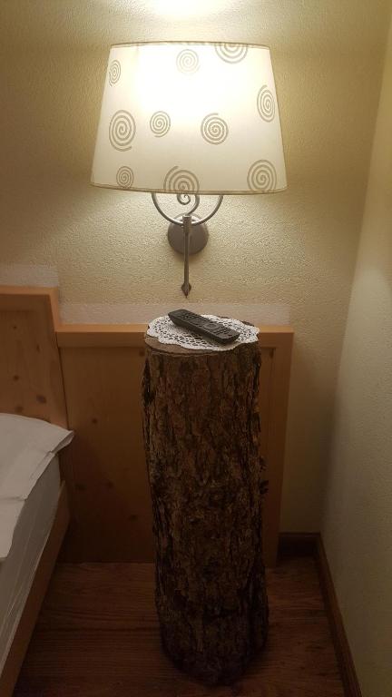 Postel nebo postele na pokoji v ubytování Hotel del Bosco