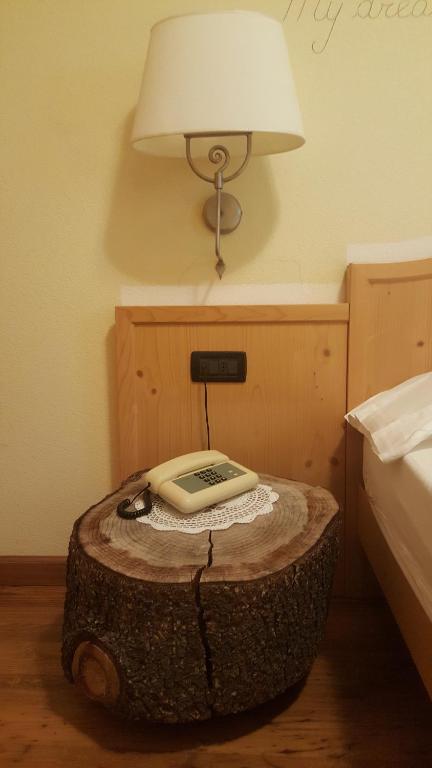 Postel nebo postele na pokoji v ubytování Hotel del Bosco
