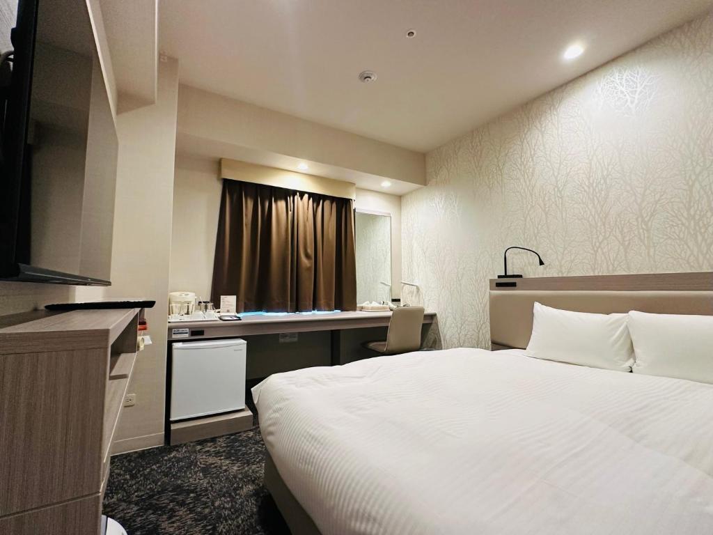 TV a/nebo společenská místnost v ubytování HOTEL FUKURACIA OSAKA-BAY